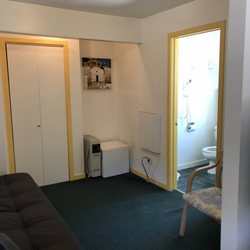 San Anselmo Inn - Additional sitting room with a leather couch and door to the bathroom. Everything was very clean.