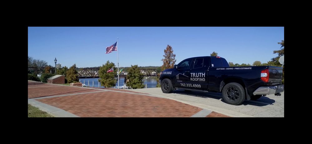 Slide of Truth Roofing