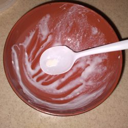 Empty bowl of clam chowder, it was taken home to eaten in bowl.