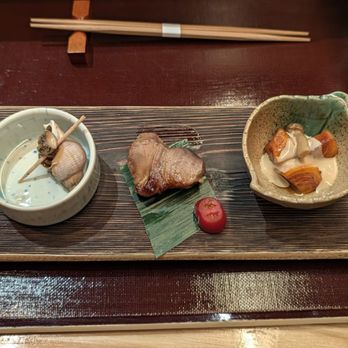 Takai by Kashiba - Starters - right to left (how to eat): persimmon with shimeji mushroom, tuna belly, sea snail? - Sushi Bars Near Me - Bellevue, Washington Takai by Kashiba - Starters - right to left (how to eat): persimmon with shimeji mushroom, tuna belly, sea snail? - Sushi Bars Near Me - Bellevue, Washington