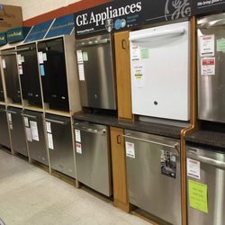 Bray & Scarff - Dishwasher showroom with multiple dishwashers lined up for display and tile flooring