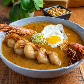 5 Esquinas - a bowl of soup with shrimp and eggs - Peruvian Near Me - Miami Beach, Florida 5 Esquinas - a bowl of soup with shrimp and eggs - Peruvian Near Me - Miami Beach, Florida