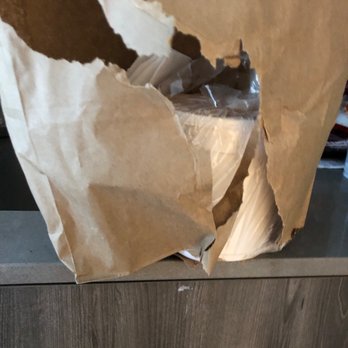 New Seoul Korean - a paper bag on a counter - Korean Near Me - Madison, Wisconsin New Seoul Korean - a paper bag on a counter - Korean Near Me - Madison, Wisconsin