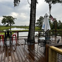 The Fish Net - The patio overlooking the pond.