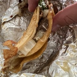 La Norteña Atx Food Truck - Side view of yummy $4 single Birria taco