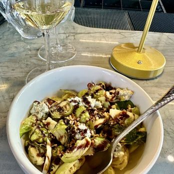 Milly's Wine Bar & Bistro - Brussel sprouts, blue cheese, breadcrumbs, and balsamic. - Wine Bars Near Me - Minneapolis, Minnesota