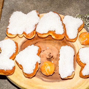 Cafe Donuts - a plate of donuts with powdered sugar on them - Donuts Near Me - Chino, California