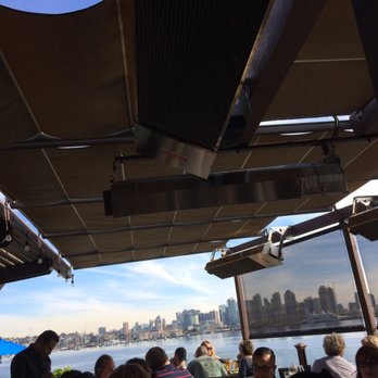 C Level - Seating with city view - New American Near Me - San Diego, California