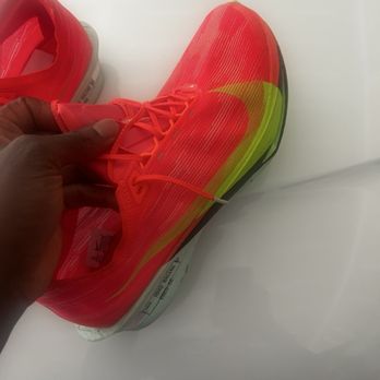 Nike Clearance Store - The separation is substantial enough that the sole is pulling away from the body of the shoe - Shoe Stores Near Me - Baltimore, Maryland