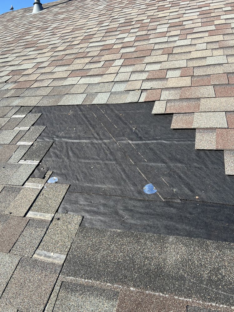 Slide of Twins Roofing