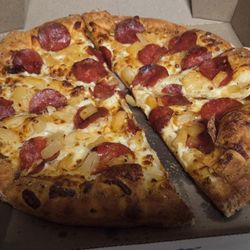 Domino's - Replacement pizza. Murdered! No butter, No Parm! Looks like the Shredder went all American Pie on It!!
