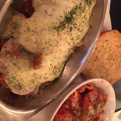 Our Place Homemade - Chicken parm boat deluxe over garlic toast with pasta