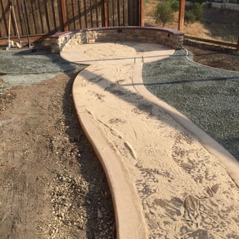 Nine Orange Landscaping - Pathway and half moon, almost done - Landscaping Near Me