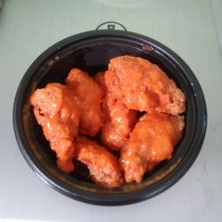 KFC - Hot wings, just ok, way too much breading! I won't be back,for seconds!