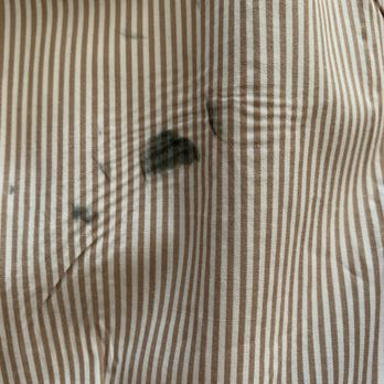Dry Clean City - Up close, you can see they scorched the shirt with the iron as well. - Dry Cleaning Near Me - Johnson City, Tennessee Dry Clean City - Up close, you can see they scorched the shirt with the iron as well. - Dry Cleaning Near Me - Johnson City, Tennessee
