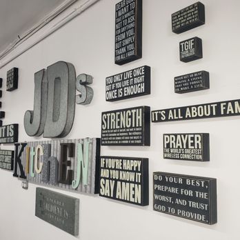 JD's Kitchen - a wall full of signs - Soul Food Near Me - Columbus, Ohio