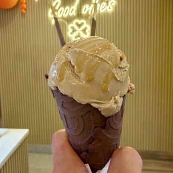 Lucky Creamery - Coffee flavor on a dark chocolate waffle cone with caramel drizzle and picky sticks ! - Ice Cream & Frozen Yogurt Near Me - Brooklyn, New York Lucky Creamery - Coffee flavor on a dark chocolate waffle cone with caramel drizzle and picky sticks ! - Ice Cream & Frozen Yogurt Near Me - Brooklyn, New York