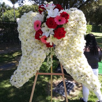 Genis Florist & Gifts - Stealing the show with the Angel Wings!!! - Florists Near Me - Rialto, California