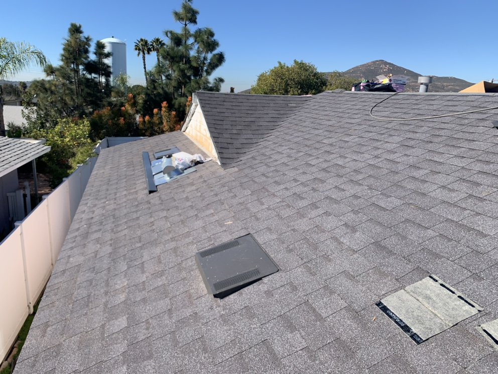 Slide of M G Roofing