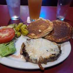 Stable's Half Pound Cheese Burger with Grilled Onions, Cheddar and Pepper-jack , Lettuce, Tomatoes and Pickles.