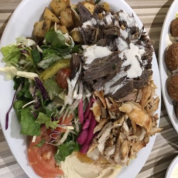 Le Palais Libanais - two plates of food - Lebanese Near Me - Gatineau, Quebec Le Palais Libanais - two plates of food - Lebanese Near Me - Gatineau, Quebec