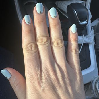 Lowry Nail Spa  - Right hand- looks cute from the top. Left hand was not the same. - Nail Salons Near Me - Denver, Colorado