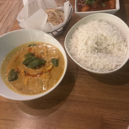 Yellow Curry and Lamb Vindaloo with basmati rice and paratha bread Yellow Curry and Lamb Vindaloo with basmati rice and paratha bread