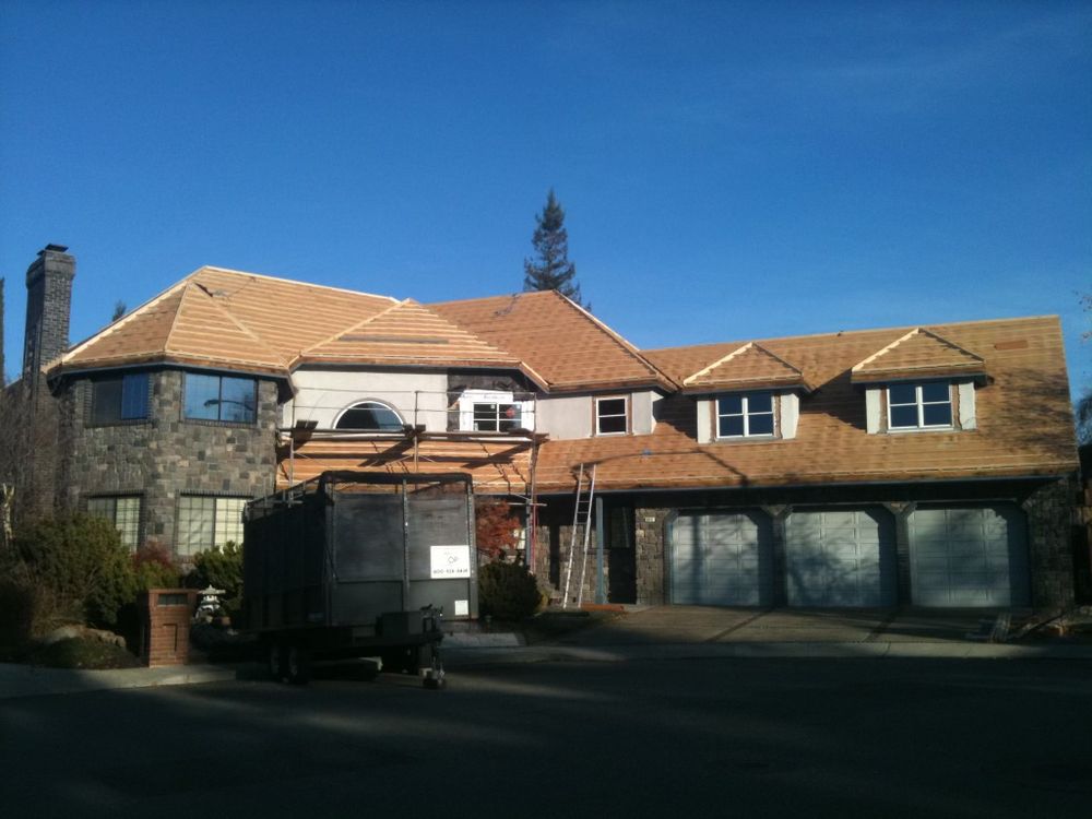 Slide of At the Top Roofing