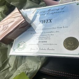 A simple box for her ashes and a certificate memorializing dear Twix. There are other options available as well