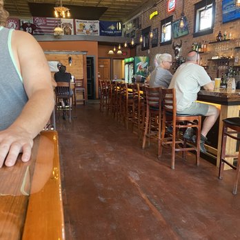 The Durham - Kitchen and Cocktails - a man sitting at a bar - Tacos Near Me - Polson, Montana