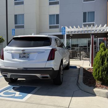 TownPlace Suites Fresno Clovis - EV charger vs handicapped parking space - Hotels Near Me - Clovis, California TownPlace Suites Fresno Clovis - EV charger vs handicapped parking space - Hotels Near Me - Clovis, California