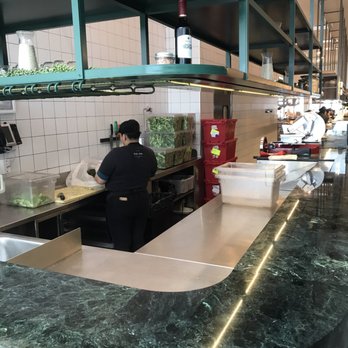Dig Inn - Cutting fresh produce - New American Near Me - Rye Brook, New York