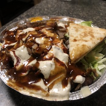 The Halal Guys - Small gyro platter, rice, lettuce, tomato, white sauce, bbq and 3 lines of hot sauce! - Halal Near Me - Costa Mesa, California The Halal Guys - Small gyro platter, rice, lettuce, tomato, white sauce, bbq and 3 lines of hot sauce! - Halal Near Me - Costa Mesa, California
