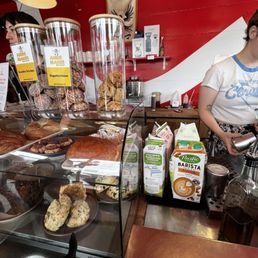 Counter with some sweet treats offered Counter with some sweet treats offered