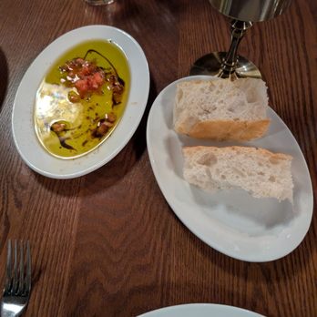 Community Brew & Tap - Complimentary bread and olive oil with tomatoes and fresh crack black pepper - Steakhouses Near Me - Cornelia, Georgia