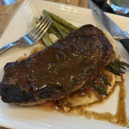 USDA Prime NY Strip* special. Mashed potatoes and charred Asparagus