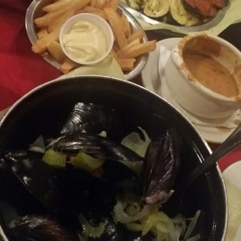 Cafe Brussels - A pot of mussels in white wine broth and their addicting fries! - Belgian Near Me - Houston, Texas Cafe Brussels - A pot of mussels in white wine broth and their addicting fries! - Belgian Near Me - Houston, Texas