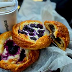 The Village Baker - Pictured: 3/4 eaten chocolate croissant... Lucky I got any Pic of it . Blackberry Danish Raspberry Danish