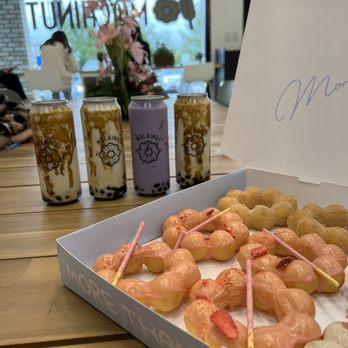 Mochinut - A dozen mochinuts, 3 brown sugar milk tea, 1 Ube milk tea - Donuts Near Me - Metairie, Louisiana Mochinut - A dozen mochinuts, 3 brown sugar milk tea, 1 Ube milk tea - Donuts Near Me - Metairie, Louisiana