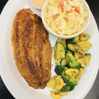 Kajun King - a plate of food with a side of vegetables - Cajun/Creole Near Me - Humble, Texas Kajun King - a plate of food with a side of vegetables - Cajun/Creole Near Me - Humble, Texas