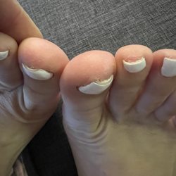 Nail Genie - She didn't get the top edge of them, pretty disappointed.... Would have been nice if they took the time to paint the whole toenail for me.