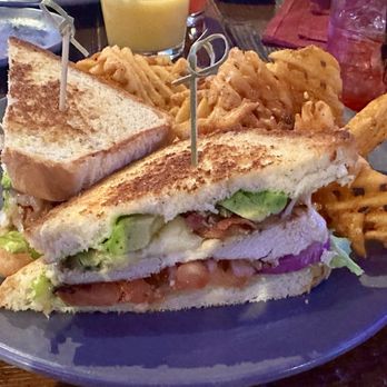 The Rabbit Hole - Chicken Avocado Sandwich with Waffle fries - Sports Bars Near Me - Minneapolis, Minnesota The Rabbit Hole - Chicken Avocado Sandwich with Waffle fries - Sports Bars Near Me - Minneapolis, Minnesota