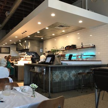 Lila - a view of a restaurant with people sitting at tables - New American Near Me - Sarasota, Florida Lila - a view of a restaurant with people sitting at tables - New American Near Me - Sarasota, Florida