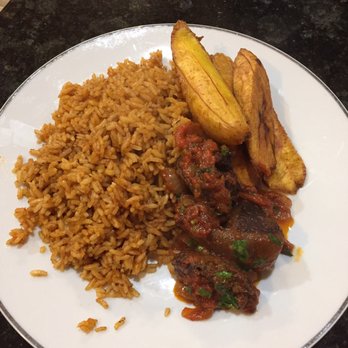 Ruth's Buka - Jollof rice, fried plantains, and goat meat. Came out piping hot and good. - African Near Me - Oakland, California Ruth's Buka - Jollof rice, fried plantains, and goat meat. Came out piping hot and good. - African Near Me - Oakland, California