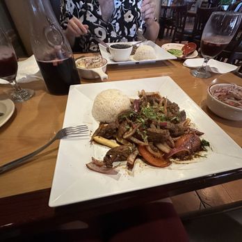 Happy Fish - Lomo Saltado, Pitcher of Chicha Morada Jarra, - Peruvian Near Me - Tampa, Florida Happy Fish - Lomo Saltado, Pitcher of Chicha Morada Jarra, - Peruvian Near Me - Tampa, Florida