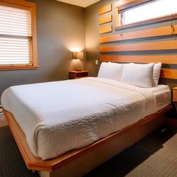 Inn of the White Salmon - Our Comfort Queen Rooms are each uniquely decorated and feature one queen bed. 180 sq ft.