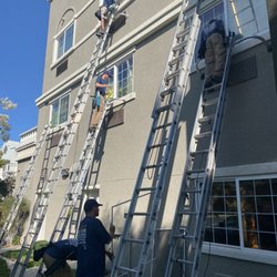 Five Star Window & Gutter Cleaning - Cleaning the windows on a hotel