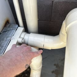 Ambiance Pool Service & Supplies - Pointing at the leak, no glue was applied in the install