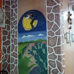 Le Mexicain - Détails de la décoration murale.