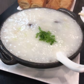 Hing Lung - Pork blood porridge. Server in the iron pot. Still bubbling on the table. It get a little thick. - Chinese Near Me - San Bruno, California Hing Lung - Pork blood porridge. Server in the iron pot. Still bubbling on the table. It get a little thick. - Chinese Near Me - San Bruno, California